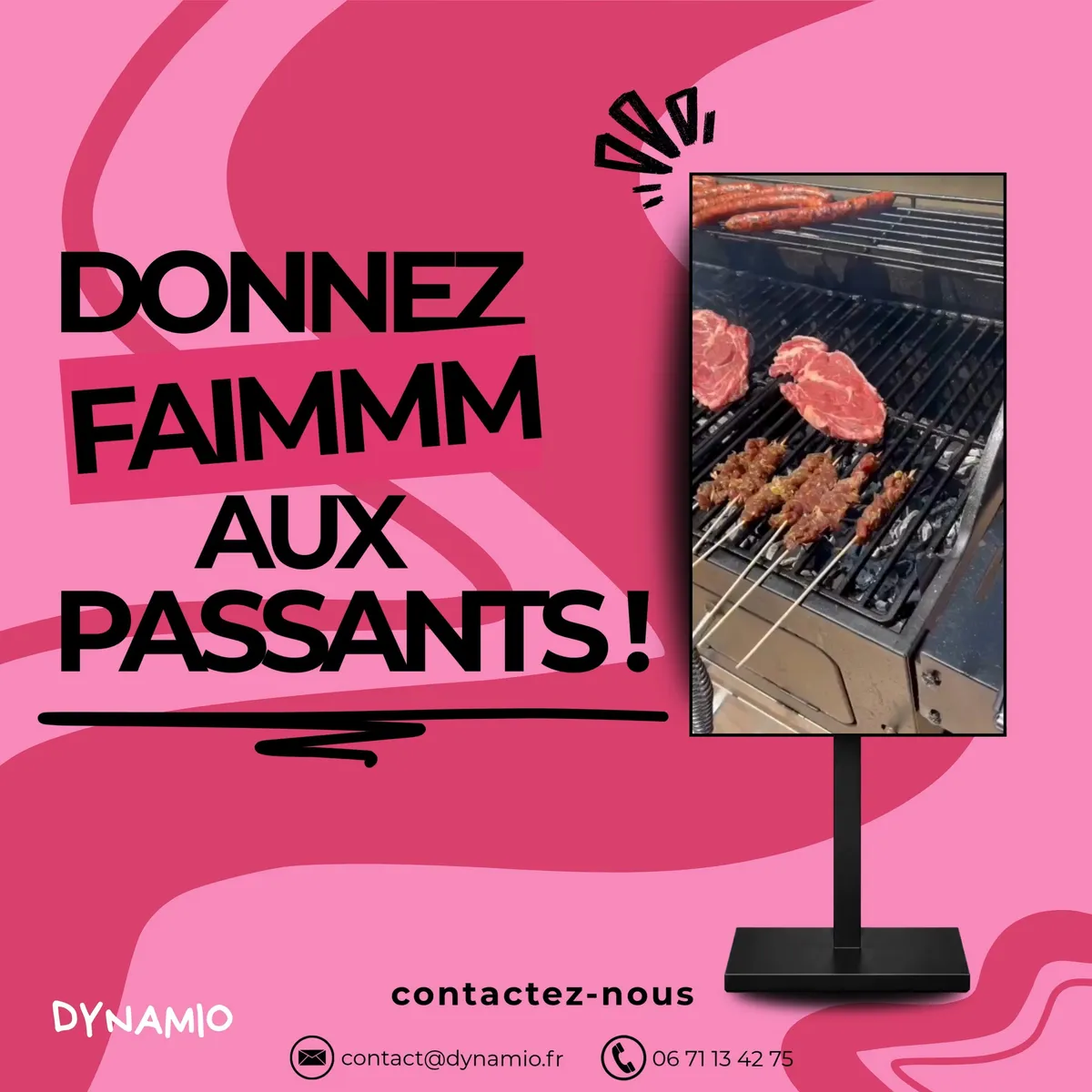 Totem LED vertical diffusant des grillades en cours de cuisson devant un restaurant